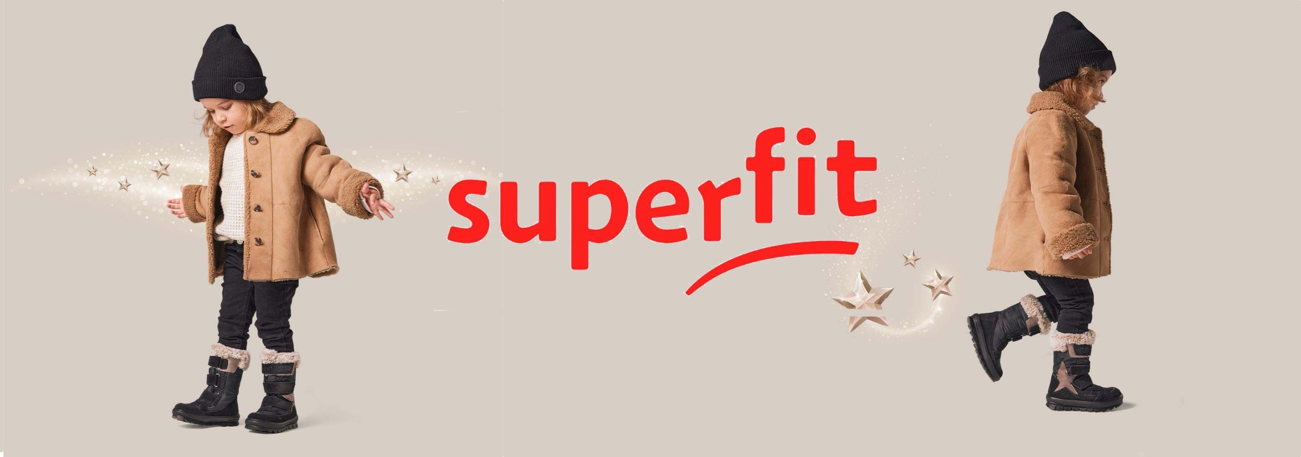 A child model wearing a tan coat, black beanie, black pants, and black boots is shown twice on a light beige background, with the red 'superfit' logo centered between the two views.